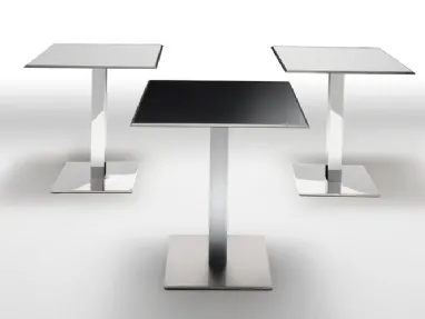 Plano Table with laminate top and chrome steel base by Infiniti.