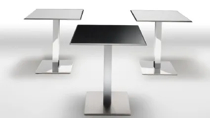 Plano Table with laminate top and chrome steel base by Infiniti.