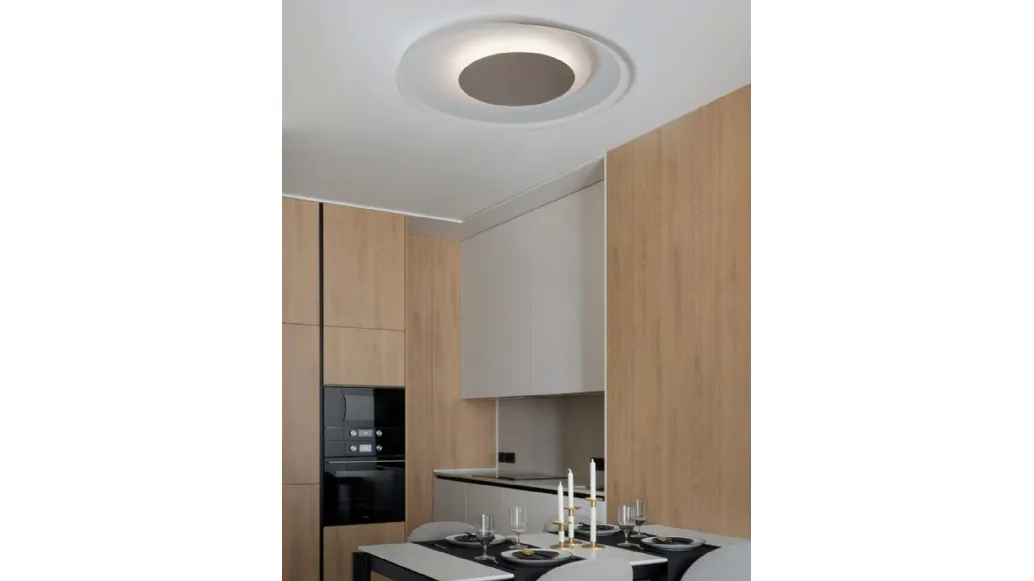 Cleo ceiling lamp in curved metal by Cattaneo.