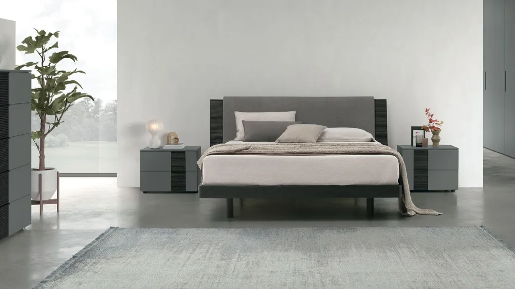 Double bed Bliss in textured oak with a headboard softened by a padded panel by Tomasella.