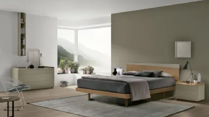 Bed with Charlie headboard in amber walnut and matte lacquered saline finish by Tomasella.