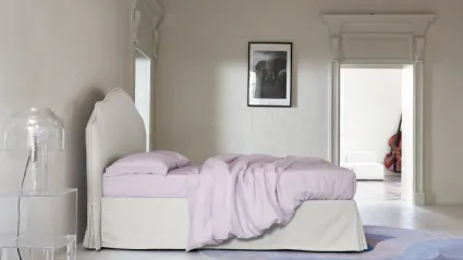 Bed with Fiordaliso headboard by Noctis