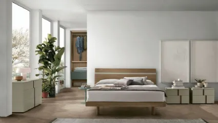 Bed with Joker headboard in textured amber walnut by Tomasella.