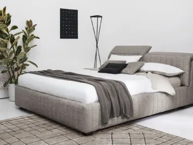 Fabric upholstered bed with vertical quilting Portland by Calligaris.