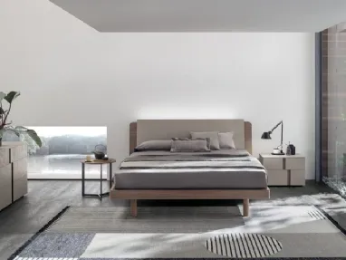 Bed in amber walnut materic and matte champagne materic with Roxy headboard by Tomasella.