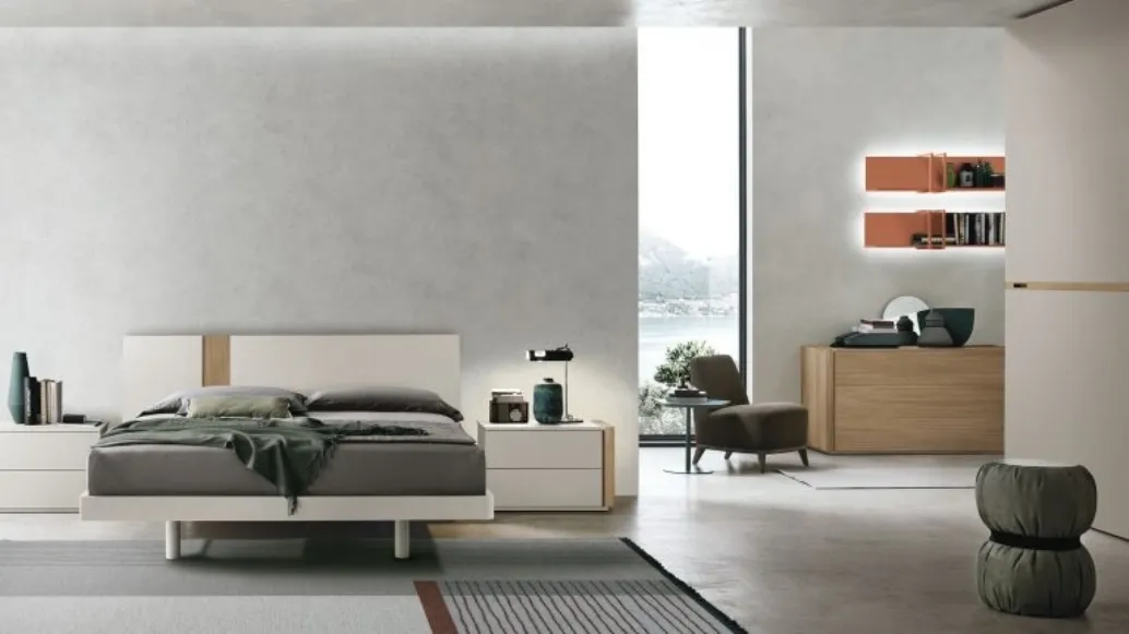 Bed made of jute material and amber walnut insert by Tomasella.