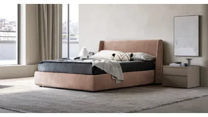 King-size fabric bed with headboard and Wave storage container by Adok.