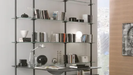 Liverpool bookcase with metal posts and glass shelves and desk by Ponti Terenghi.