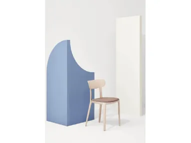 Canova chair in polypropylene with upholstered fabric seat by Infiniti.