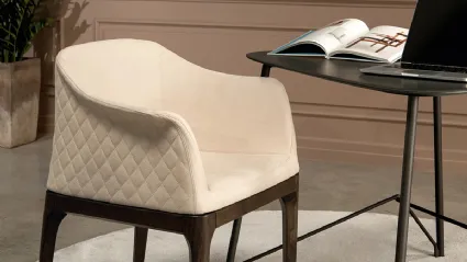 Armchair with quilted diamond pattern leather backrest Gilda Elite by Tonin Casa.