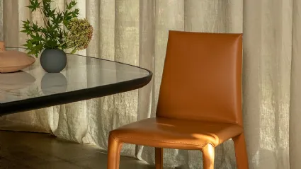 Fully upholstered Lisa chair in Tonin Casa leather.