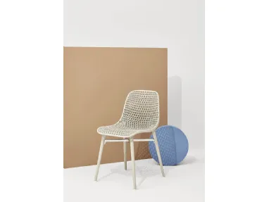 Next chair with perforated polyamide shell and legs in Natural solid Ash by Infiniti.