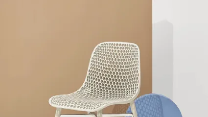 Next chair with perforated polyamide shell and legs in Natural solid Ash by Infiniti.