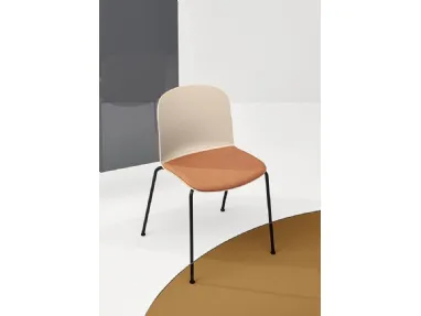 Relief 4 Legs chair in polypropylene with padded fabric seat and steel legs by Infiniti.