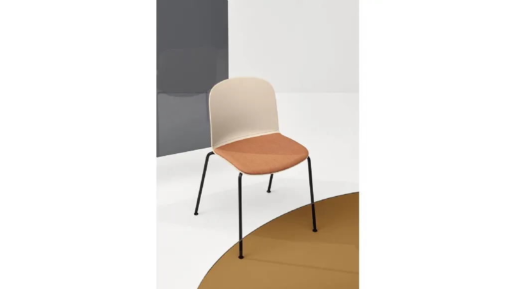 Relief 4 Legs chair in polypropylene with padded fabric seat and steel legs by Infiniti.