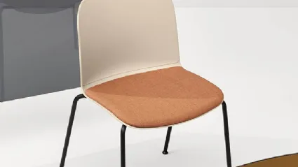 Relief 4 Legs chair in polypropylene with padded fabric seat and steel legs by Infiniti.