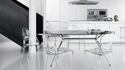 Oval glass and steel Metro dining table by Brianza Chairs.