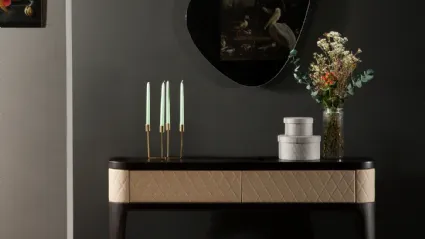 Mobile entrance console Tiffany made of wood with front covered in quilted diamond-patterned eco-leather by Tonin Casa.