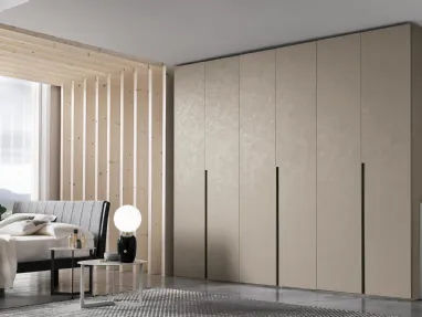 Wardrobe with swinging door Doris in concrete effect finish by Tomasella.