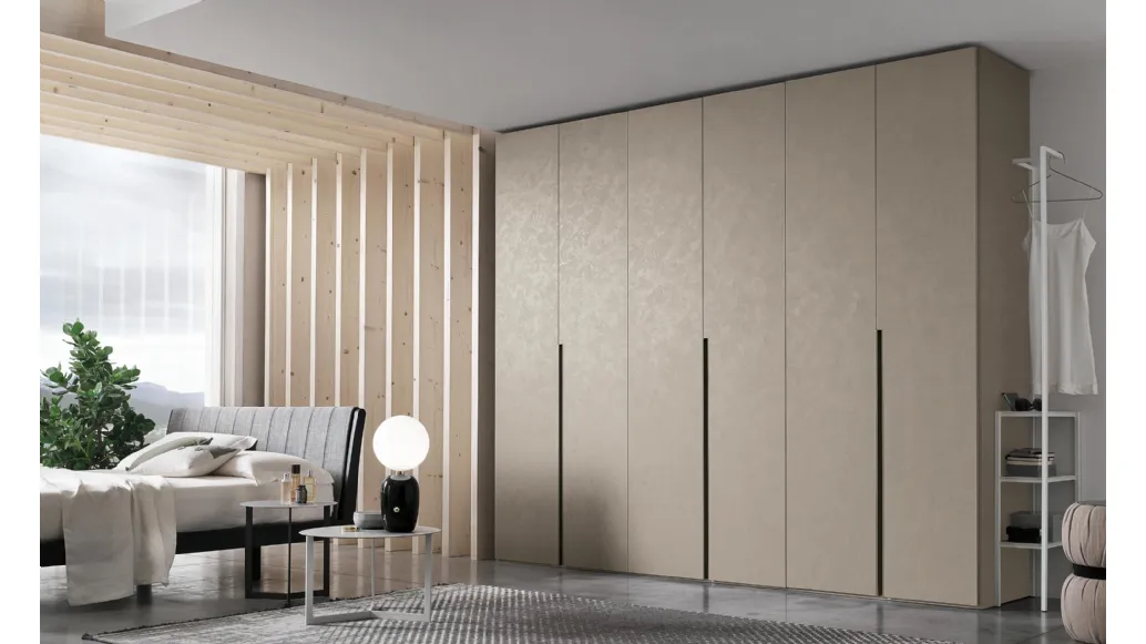 Wardrobe with swinging door Doris in concrete effect finish by Tomasella.