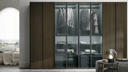 Metropolis wardrobe in thermo-treated oak with thermo-treated oak doors and smoked glass 363 by Tomasella.