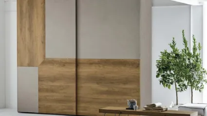 Wardrobe with sliding door Remix in cement material and light knotted material by Tomasella.
